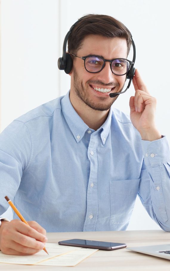 smiling-male-customer-service-worker-sitting-with-2023-11-27-05-29-53-M7BJ96J.jpg smiling-male-customer-service-worker-sitting-with-2023-11-27-05-29-53-M7BJ96J.jpg